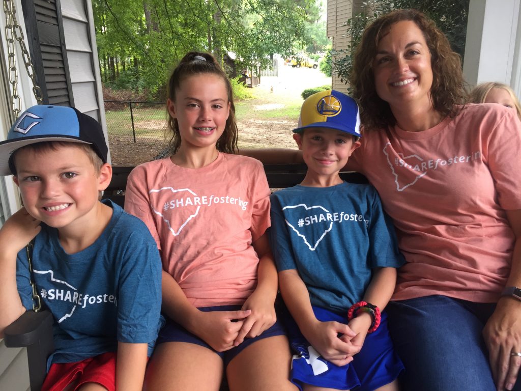 Family wearing ShareFostering shirts
