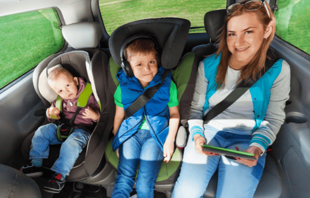 3 kids in car seats going on a sibling visit