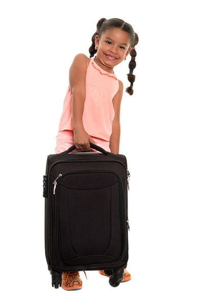 child with suitcase