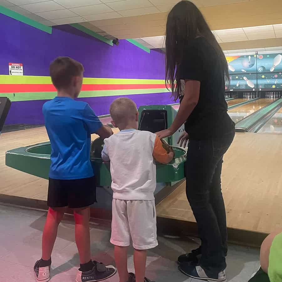 Two brothers bowling